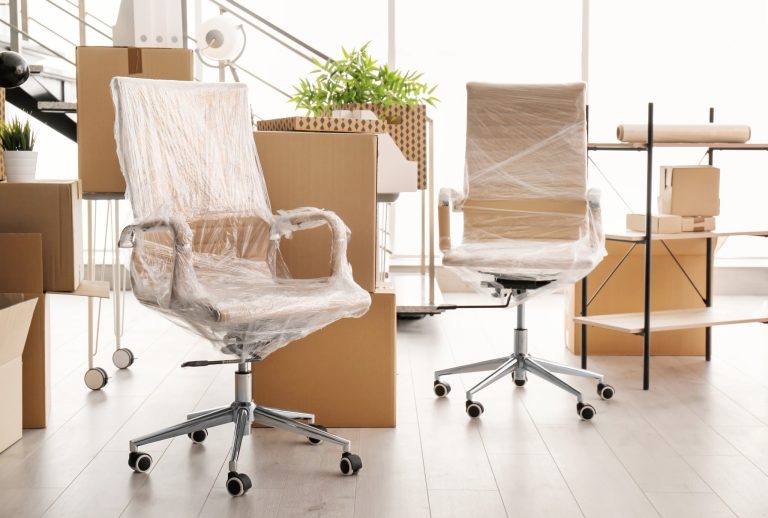 moving boxes and furniture in new office